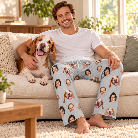 Custom men's pajama pants with family and pet faces worn beside a dog in a warm home scene