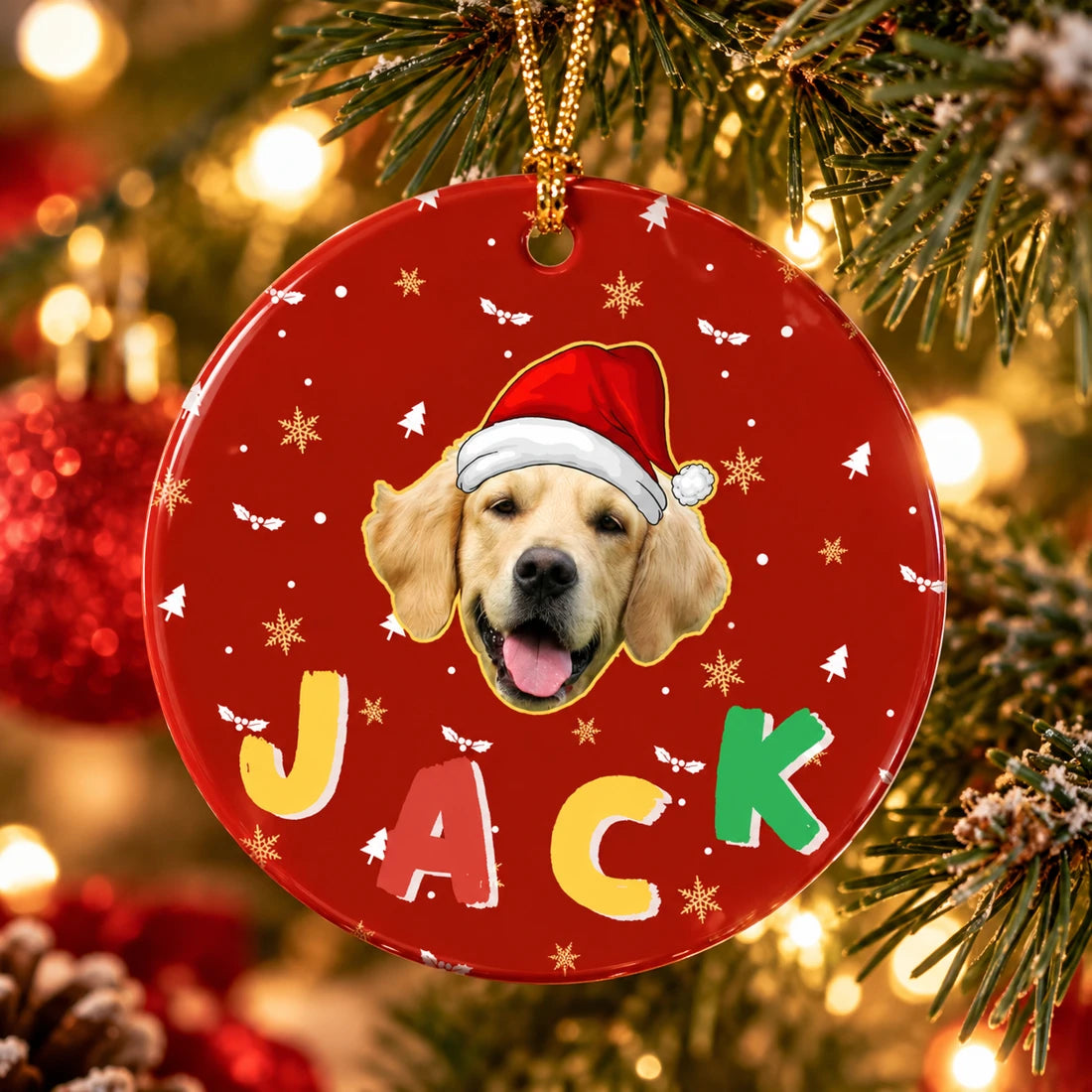 Personalized pet-photo ornament hanging on a warmly lit Christmas tree